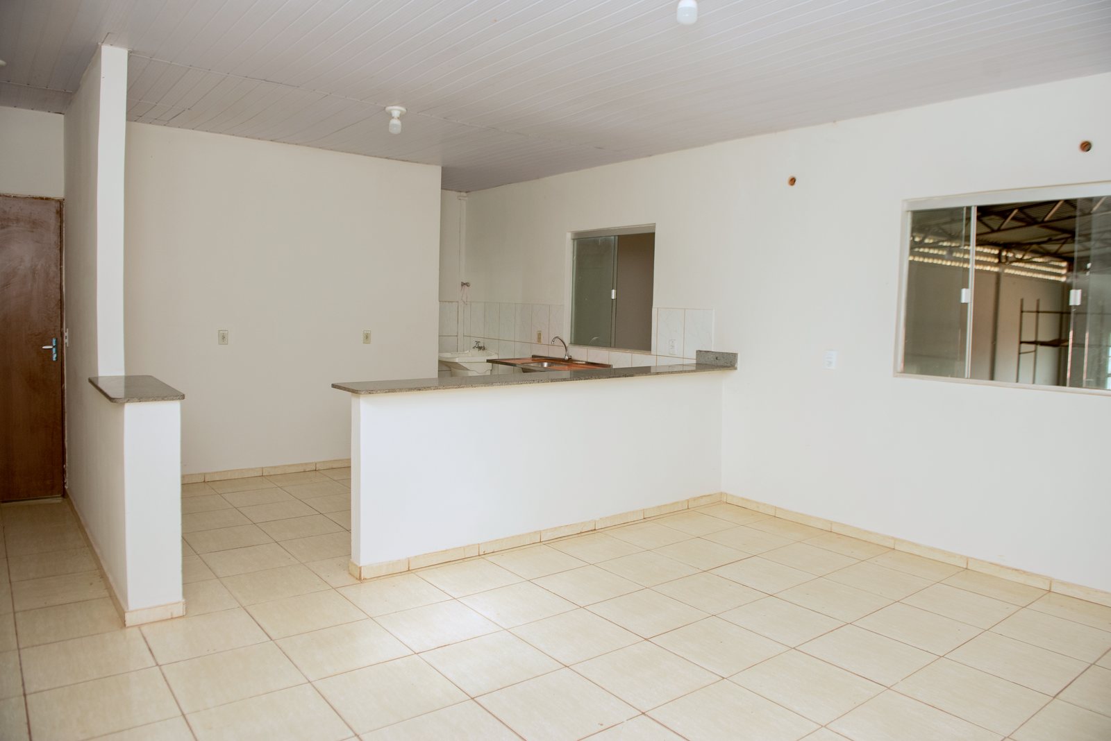 Sala do pavimento superior com copa